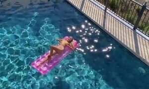 'a beautiful blonde masturbates in the pool and lures a peeping guy into a blowjob'