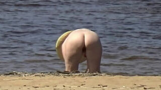 Hot milf on a nude beach&period;