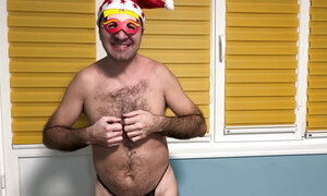 Santa Earl show's his natural hairy body and new black thongs