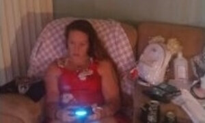 Pretty Milf In Red Mini Night Gown Smoking Cigarettes and Playing Video Games