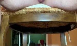 'Amateur milf rides a big dick in her ass on a chair'