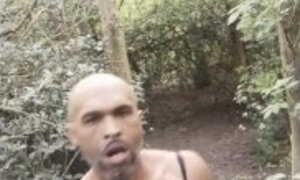 horny black guy with cum dripping face masturbating big black cock openly in the woods and cums