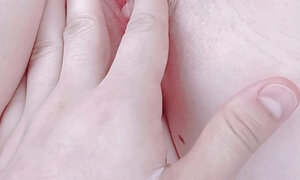 masturbating her urethra and clitoris with my fingers, close-up